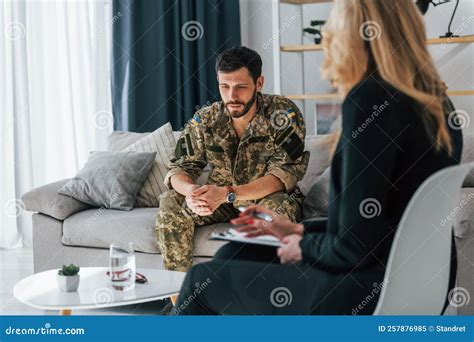 Soldier Have Therapy Session With Psychologist Indoors Stock Image