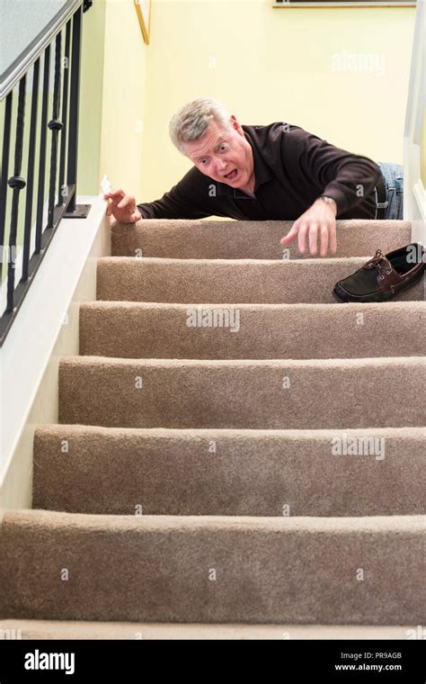 Senior Man Falling Down Stairs Stock Photo Alamy