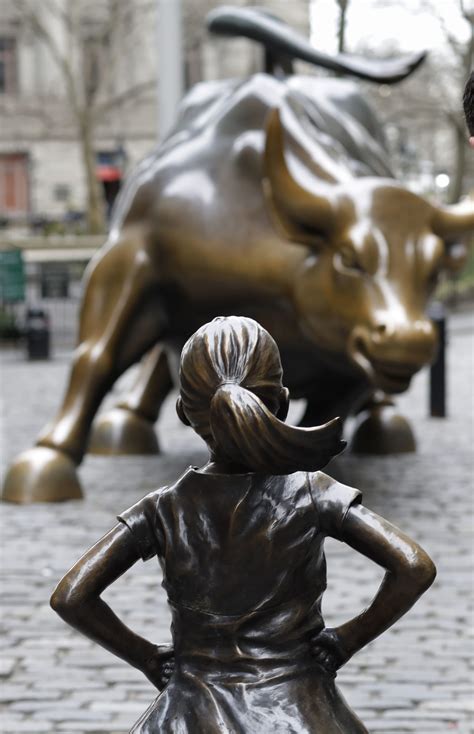 Fearless Girl Statue Stares Down Wall Streets Iconic Bull Citynews