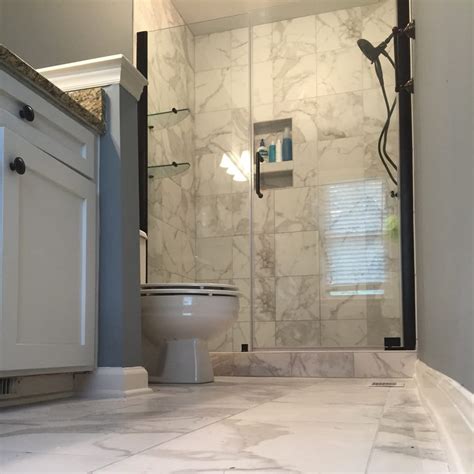 The mosaic here uses varying shades of green and gray for a the simplicity of popular bathroom tile ideas can be deceptive. bathroom remodel with faux marble tile. It's porcelain ...