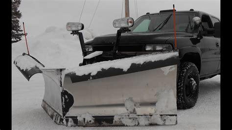 Snow Plowing Silverado Duramax Dually With Snowdogg Vxf95 V Plow Youtube