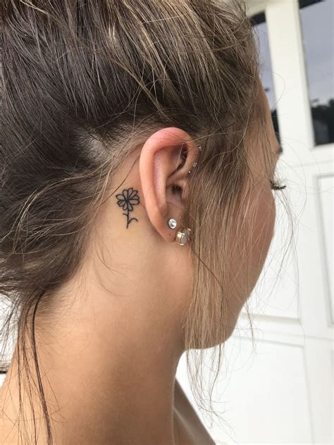 Simple Flower Tattoo Behind Ear Simple Flower Tattoo Behind Ear