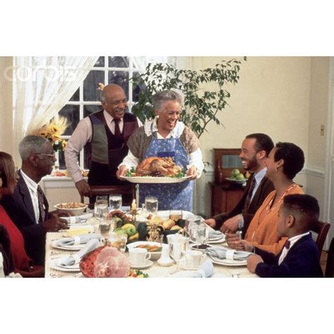 Thanksgiving dinner is probably the biggest feast one could prepare in a year. African American Family Enjoying Thanksgiving Dinner liked on Polyvore | African american family ...
