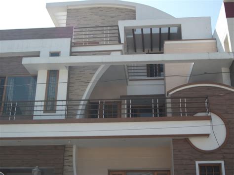 Home Elevation Design With Curve Line Concept Gharexpert