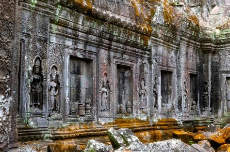 Premium Photo Stone Carvings On The Wall Of The Temple Angkor Wat