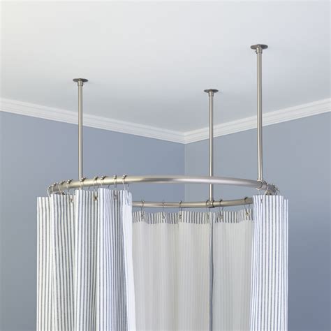 I am looking for possible suggestions for a shower curtain rod installation, perhaps hanging from the wall above where the rod is currently installed. 32" Round Shower Curtain Rod