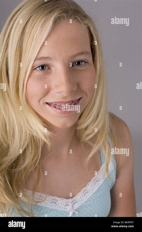 Portrait Teenage Girl Wearing Braces Blond Straight Hair Front View