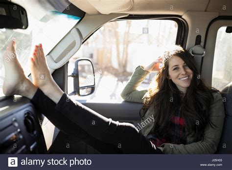 Barefoot Girl Driving VW Bus