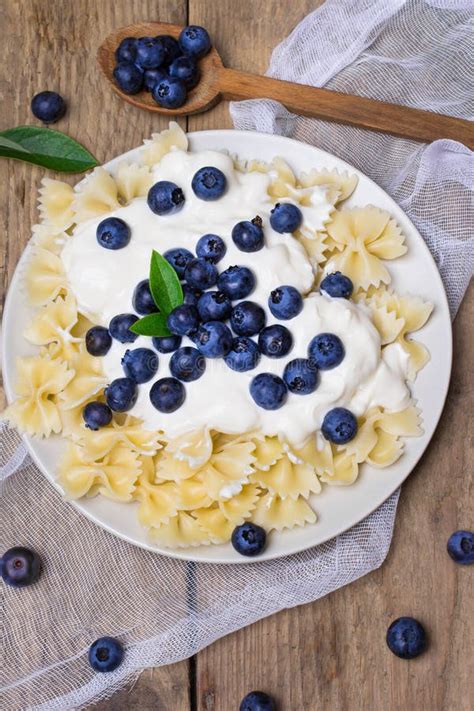 Tasty Pasta With Fresh Organic Blueberries And Vanilla Cream Stock