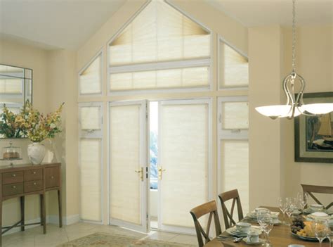 Many arched and angled windows are higher off of the ground. How to Cover Up Odd Shaped Windows