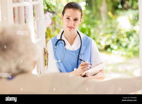 Nice Nurse Checking Patients Health Stock Photo Alamy