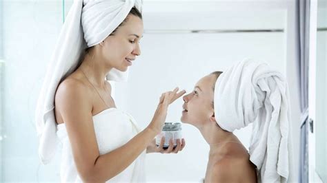 mother daughter applying face cream alena ozerova spa prices face cream