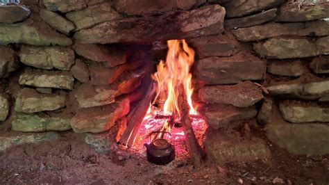 Fireplace Inside Survival Shelter Made Of Stone Bushcraft Shelter