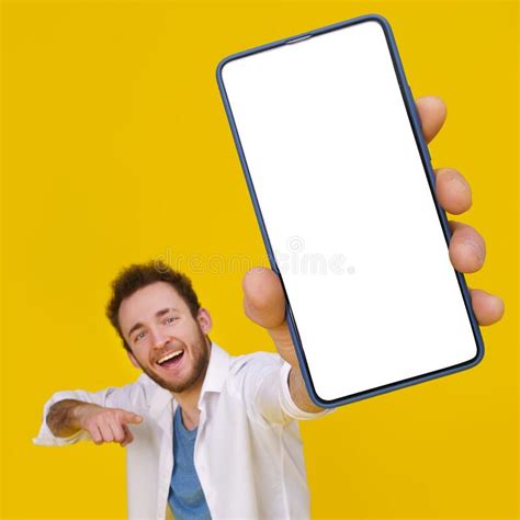 Young Happy Man Holding Smartphone Showing A White Empty Screen Check This Out Cellphone