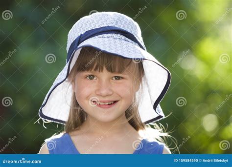 Close Up Portrait Of Happy Smiling Little Girl In A Big Hat Child