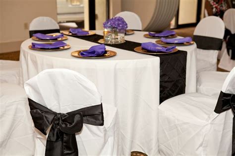 Our chair covers for folding chairs also pair well with our polyester tablecloths for a complete and coordinated design. Tables were covered with white linen tablecloths and black ...