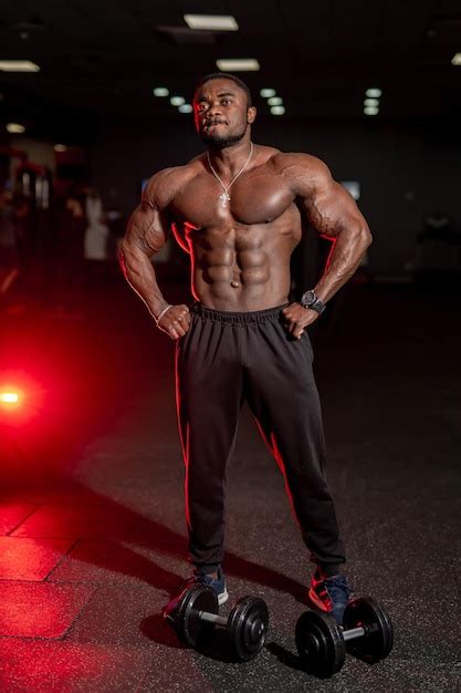 Premium Photo Halfnaked Strong African American Bodybuilder Standing