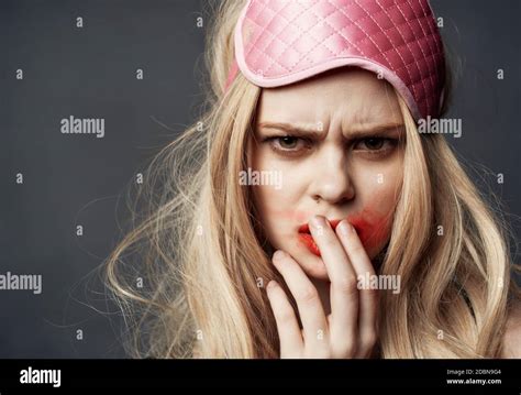 Woman With Pink Mask On Her Head Smeared Red Lipstick All Over Her Face