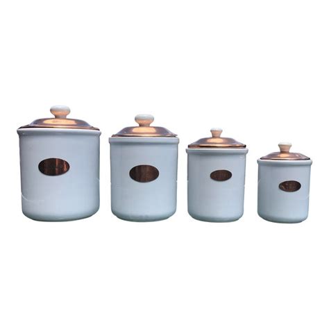 No matter the type you choose, look for a smooth bottom. Vintage White Ceramic & Copper Kitchen Canisters With Lids ...