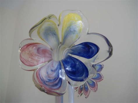 With a turned stem and domed foot, each inscribed 'west u. 2 Murano Italy Long Stemmed Flowers at 1stdibs