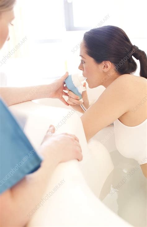 See why bath fitter's acrylic bathtub liners last a lifetime! Water birth - Stock Image - F003/9256 - Science Photo Library