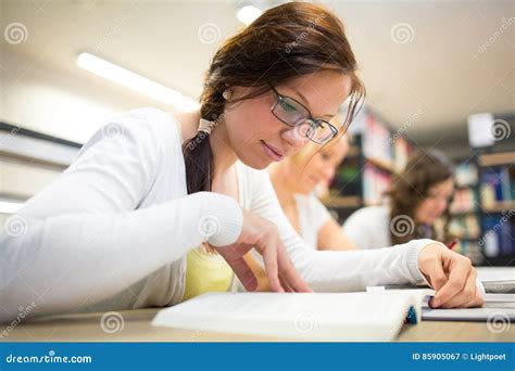 Group Of University Students Studying Hard For An Exam Stock Image