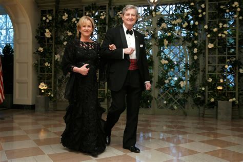 Senator Kennedy and his wife arrive for the State Dinner in honor of