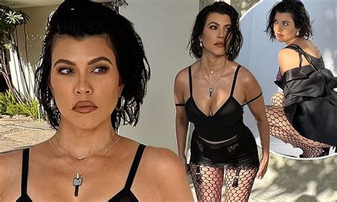 kourtney kardashian flashes a black bra and her toned legs in behind the scenes images daily