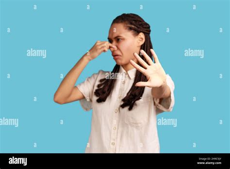 Woman With Dreadlocks Pinching Nose Stop Breathing Bad Odor Disgusted