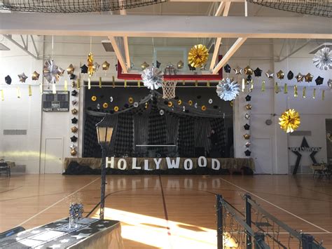 Show your creative side by making black silhouette masks from black paper stock and dowel rods. Dance decorations. Hollywood theme. | Dance decorations ...