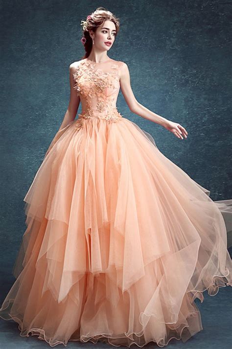 Try opting for an open neckline for a more. Ball Gown Sleeveless Peach Tulle Ruffle Wedding Prom Dress