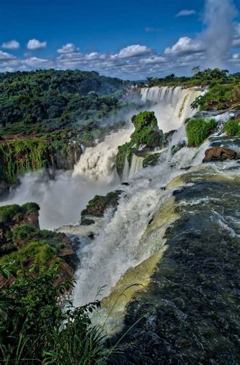 Iguazu Falls On The Border Of Brazil And Argentina Places Around The
