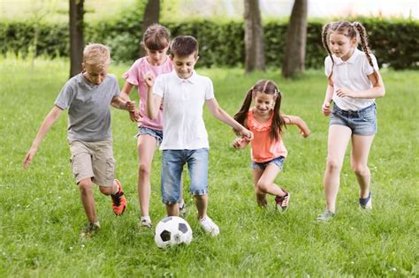 Free Photo Children Playing Football Outside
