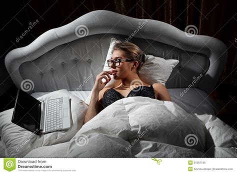 Woman Lying On Bed With A Laptop Stock Image Image Of Ecstasy Laptop