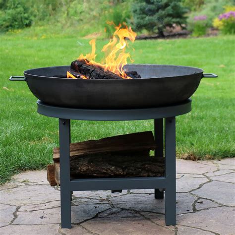 It is definitely a change from the lineup so far as the pentagon chiminea fire pit borrows. Sunnydaze Cast Iron Round Fire Pit Bowl with Built-in Log Rack - Outdoor Wood Burning Fireplace ...