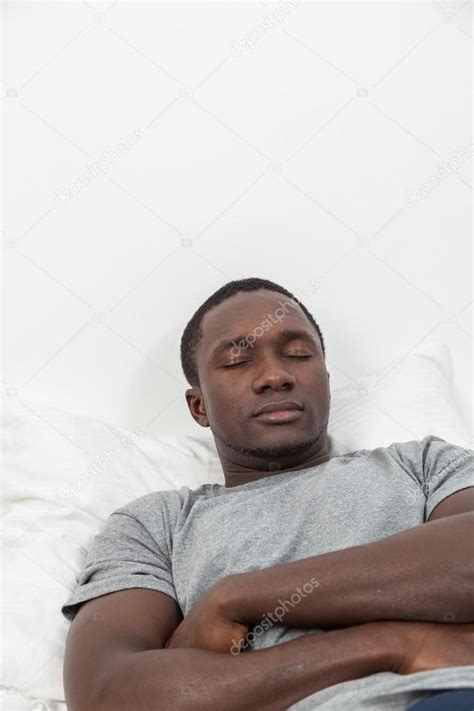 Black Man Sleeping In Bed Stock Photo By ©implementar 88682716