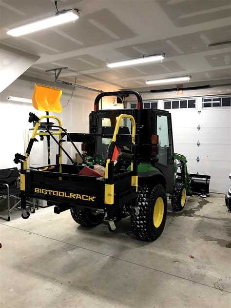 The New John Deere 2038r With Bigtoolrack Curtis Cab And Wr Long Plow