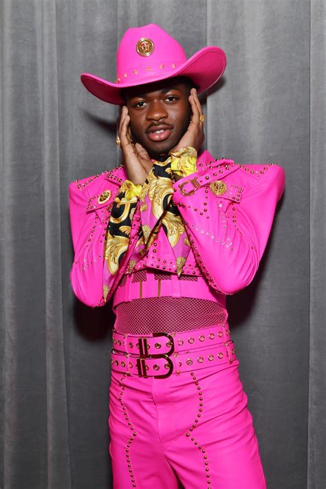 Old town road — lil nas x. 2020 Grammys: Lil Nas X turns heads in a hot-pink Versace outfit on the red carpet - Los Angeles ...