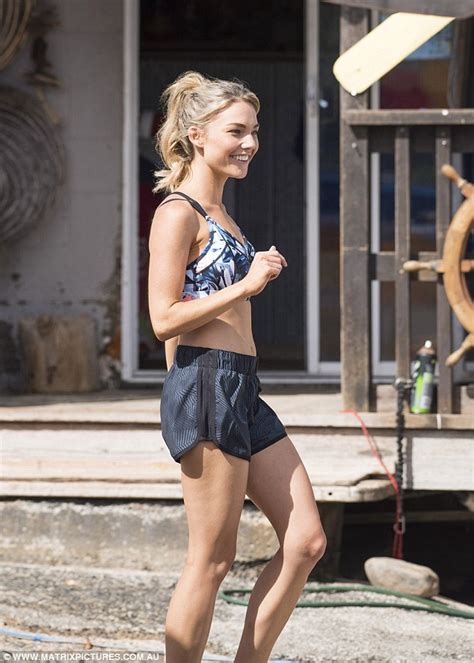 sam frost shows off honed physique in mid riff baring gym top daily mail online