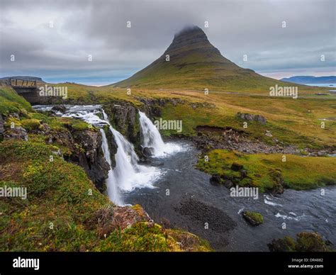 Kirkjufellsfoss Waterfall And Kirkjufell Mountain Iceland Stock Photo