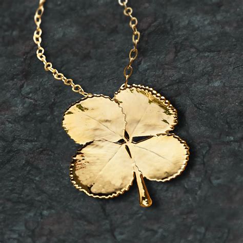The Gilded Four Leaf Clover Necklace Hammacher Schlemmer