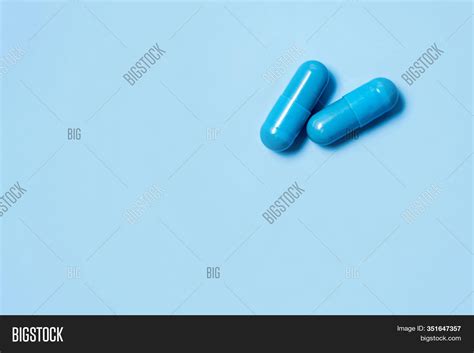 two blue capsules image and photo free trial bigstock