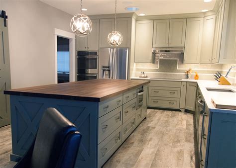 Shiplap walls, black cabinetry, and beautiful, butcher block countertops in acacia wood are the winning trio in this modern farmhouse inspired kitchen featured on maison de pax. Contemporary farmhouse kitchen with a butcher block walnut ...