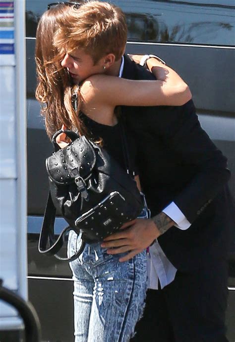 Someone Still Has Bieber Fever Justin Spotted Hugging Mystery Girl