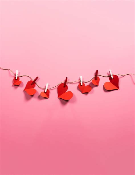 Download Really Cool Love Paper Hearts Hanging Wallpaper