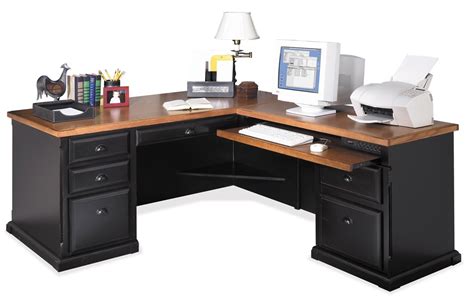 The spacious work surface of this home office desk has room for your computer, pens, binders, folders and a little home decor. Guide to Buying Computer Desks for Home | atzine.com