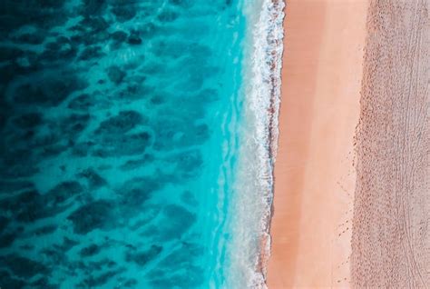 Premium Photo Birds Eye View Photography Of A Beach With Beautiful Waves