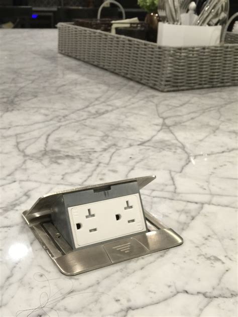 Buy waterproof pop up power receptacles that disappear in your granite island meeting electrical code. Pop up island electric outlets perfect for plug in griddle ...