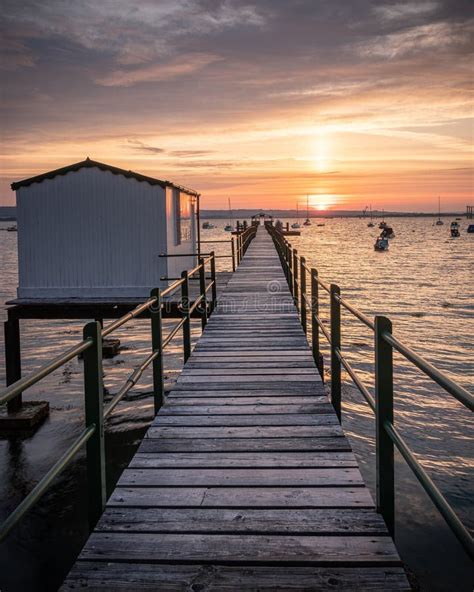 An Old Wooden Jetty Or Pier At Sunrise Stock Image Image Of Nautical