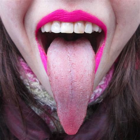 image may contain one or more people and closeup fake lips pink lips tongue instagram